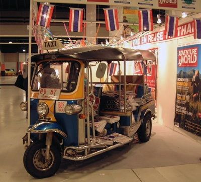 Thailand og reisemålene  i Sør-Øst Asia var tilstede .. blant annet med denne sykkeltaxien