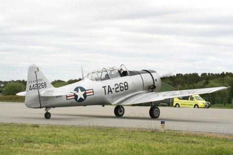 dette flyet opereres av Scandinavian Historic Flight. LN-TEX har en fortid i det portugisiske flyvåpen som både trener og lett angrepsfly under kolonikrigene i Afrika. Flyet ble brakt til Norge allerede i 1979 og var dermed en av de første skikkelige Warbirds her i landet.